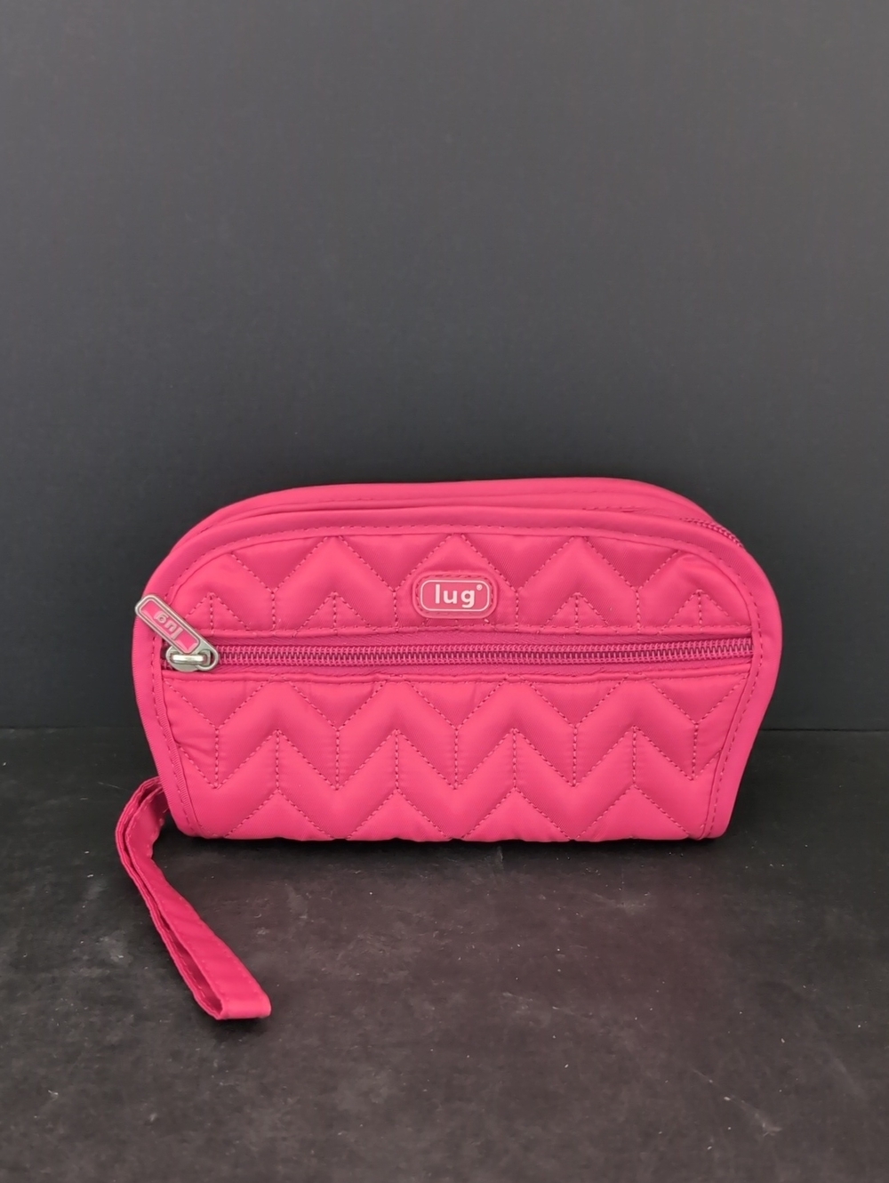 Hot Pink Lug Flipper Travel Jewelry Clutch In A Quilted Chevron Pattern.